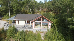 Holiday home in Dalskog with a panoramic lake view in Dalskog